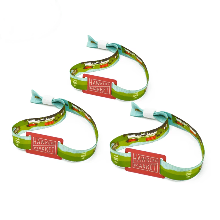 Pulseiras RFID de tecido para pagamentos cashless e controle de acesso em eventos.
