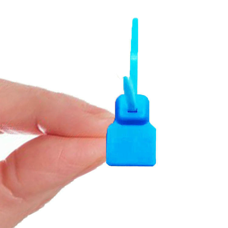 Foto de Etiquetas NFC com Abraçadeira para Itens Pequenos mostrando instalação em superfície metálica na categoria Tags RFID com abraçadeira.