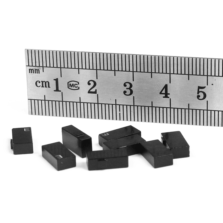 A C1005-1 ceramic RFID tag is mounted on a metal medical instrument tray to illustrate effective asset inventory management.