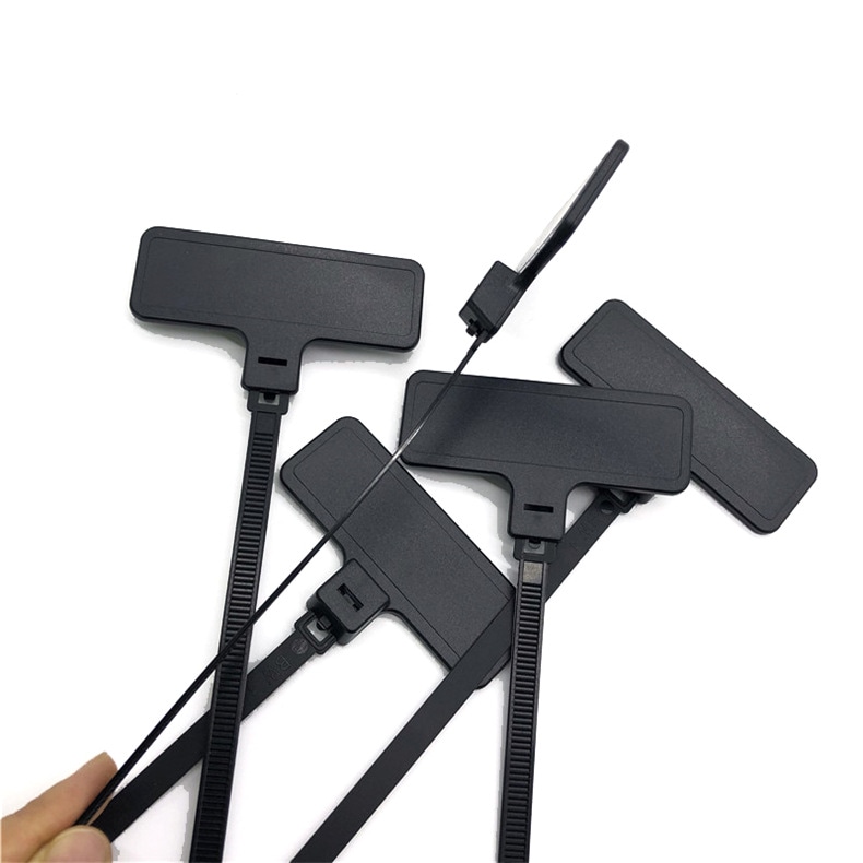 Conjunto de etiquetas RFID com abraçadeira Z28575-1 pretas, preparadas para instalação em campo.